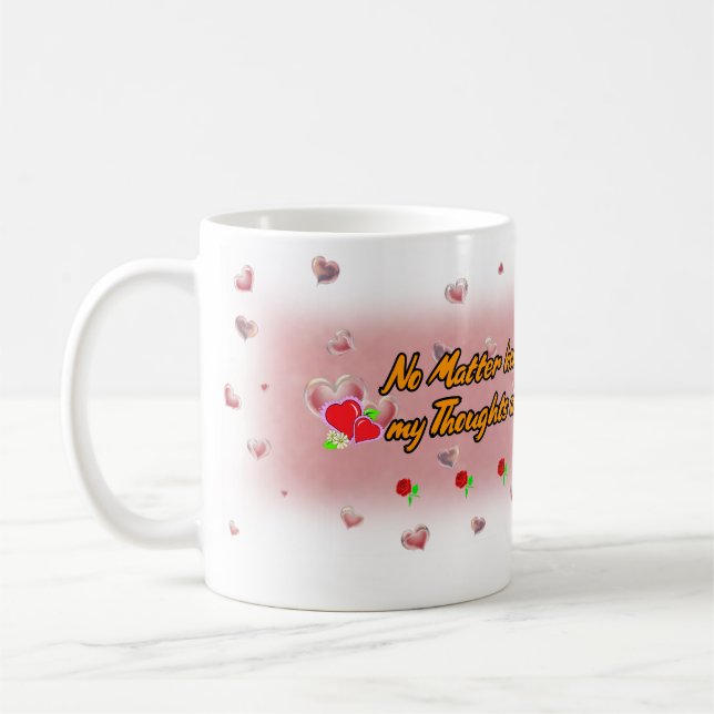 Poesie und Blasen auf einer weißen Keramik Kaffeetasse (Links)