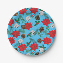 Poinsettias und Silberglocken in Tellern mit blaue