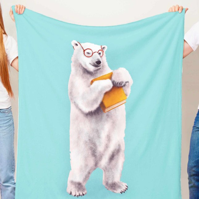 Polar Bear Book Lover Nerdy Fleecedecke (blue blanket with a cute smiling polar bear with eyeglasses holding a yellow book, held in hands)