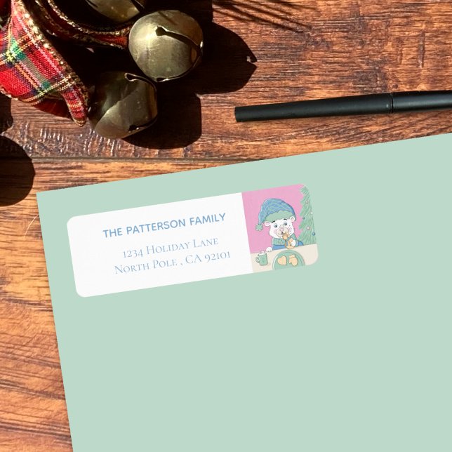 Polar Bear Cube Eating Christmas Cookie (Sweet polar bear cub Christmas return address label on an envelope .)