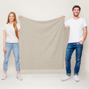 Polka dotiert auf einem texturierten Beige Fleecedecke