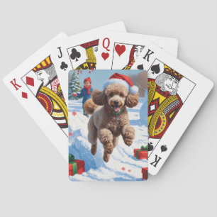 Poodle läuft im Schnee mit Weihnachtshut Spielkarten