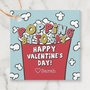 Popcorn-Poppen durch Valentinaufkleber Geschenkanhänger