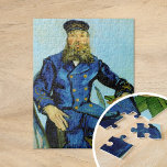 Postman Joseph Roulin | Vincent Van Gogh Puzzle<br><div class="desc">Porträt des Postmanns Joseph Roulin (1888) von dem niederländischen Postimpressionisten Vincent Van Gogh. Original Malerei ist ein Öl auf Leinwand. Das Portrait ist eines von mehreren Van Gogh Gemälden seines nahen Freundes, eines Postangestellten in der südfranzösischen Stadt Arles. In dieser Version sitzt Postman Roulin an einem Tisch vor einem hellblauen...</div>