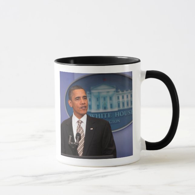 Präsident Barack Obama macht eine Mitteilung Tasse (Rechts)