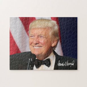 Präsident Donald Trump mit seiner Unterschrift Puzzle