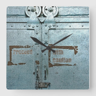 Proceed with caution blue grey industrial door quadratische wanduhr