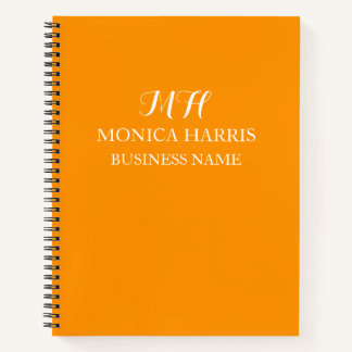 Professionelles orangefarbenes Monogramm-Anfangsbu Notizbuch