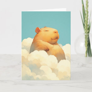 Pummeliger Capybara ruht auf einer Wolke Karte