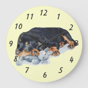 puppy cuddling teddy bear rottweiler dog wristwatc große wanduhr