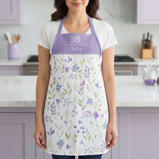 Purple Floral Monogram Apron Schürze (pretty purple blue wildflower floral apron with elegant monogram in script calligraphy)