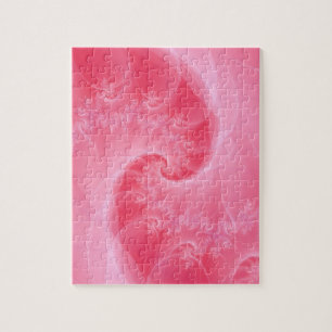 Puzzle aus rosa und weißer Drehung