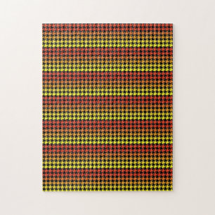 Puzzle mit rotem, gelbem Hahnentrittmuster