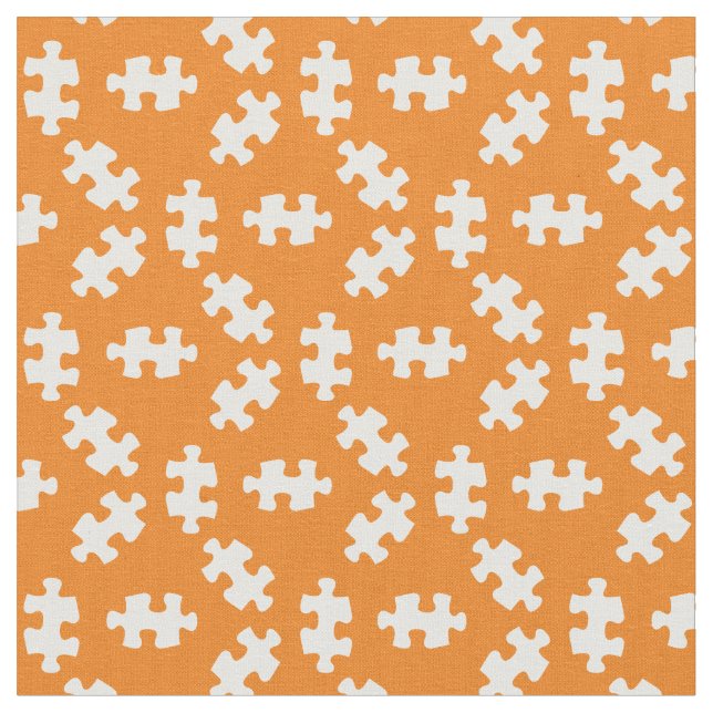 Puzzleteile Orange und Weiß Stoff (Nahaufnahme)