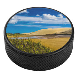 Quicksand-Fluss in der Nähe von 90 Mile Beach, Neu Eishockey Puck