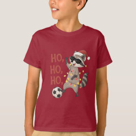 Raccoon with lights and Christmas hat playing socc T-Shirt