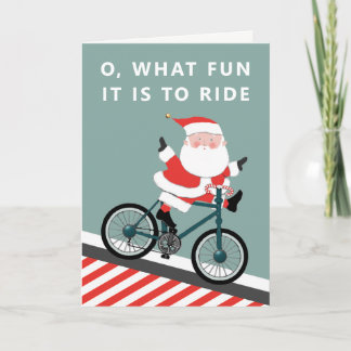 Radfahrer fährt Weihnachtsgrußkarte Feiertagskarte