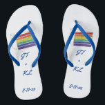 Rainbow LGBT Gay Wedding Layer Flip Flops<br><div class="desc">Flip-Flops verfügen über eine originale Marker-Abbildung eines mit Vanille-Zuckerguss bestückten Regenbogenkuchenschnitts. Einfach mit Ihren Initialen und Datumsinformationen personalisieren für eine einzigartige Gastgeschenk Hochzeit!</div>