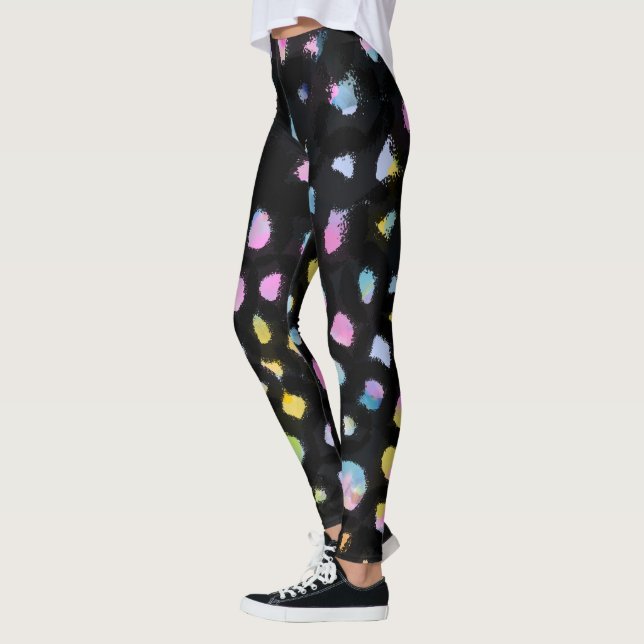 Rainbow Splash Design auf schwarzem Hintergrund Leggings (Links)
