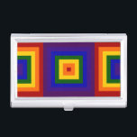 Rainbow Squares Visitenkarten Dose<br><div class="desc">Zeigen Sie Ihre Liebe der Farbe mit abwechselnden geometrischen Regenbögen. Eine Reihe roter, orangefarbener, gelber, grüner, blauer, indigofarbener und violetter Quadrate strahlen aus dem Mittelpunkt dieses festlichen Designs aus. Auf beiden Seiten des Hauptplatzes befinden sich die Hälfte von 2 Regenbogenquadraten mit den Farben in umgekehrter Reihenfolge. Digitales Bild 10400 x...</div>