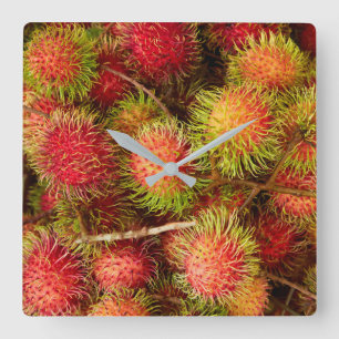 Rambutan Fruit auf dem Markt von Can Duoc Quadratische Wanduhr