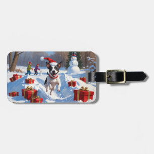 Rat Terrier läuft im Schnee mit Weihnachtshut Gepäckanhänger