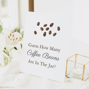Raten Sie mal, wie viele Kaffeebohnen Babyduschens Sockelschild