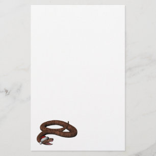 Rattlesnacht mit Weihnachtsmannmütze