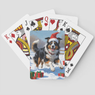 Raucollie läuft im Schnee mit Weihnachtsmütze Spielkarten
