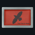 Raven on Red Rechteckige Gürtelschnalle<br><div class="desc">Eine einfache,  schwarze Silhouette eines Raven (Corvus corax) auf einem roten,  lederfarbenen Hintergrund. Das Rabe-Bild hat einen leichten "rauen" oder "abgenutzten" Effekt. Fügen Sie Ihren eigenen Text hinzu.</div>