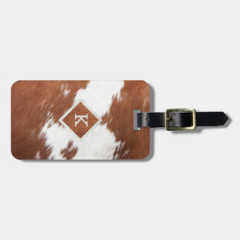 Realistisches Monogramm aus brauner und weißer Kuh Gepäckanhänger