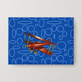 Red Bi-Flugzeug auf Blue Circles and Loops Button