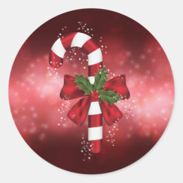 Red Candy Cane auf einem roten Bokeh Hintergrund Runder Aufkleber
