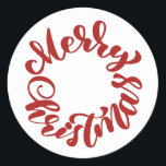 Red Merry Christmas Calligrafy Wreath Runder Aufkleber<br><div class="desc">Frohe Weihnachten! Fügen Sie Ihren Umschlägen,  Karten und Geschenken einen festlichen Akzent mit diesem Ferienaufkleber hinzu. Es zeichnet sich durch eine moderne rote Kalligraphie aus. Dieser Weihnachtsaufkleber ist perfekt als Umschlag Aufkleber und als Geschenkverpackung.</div>
