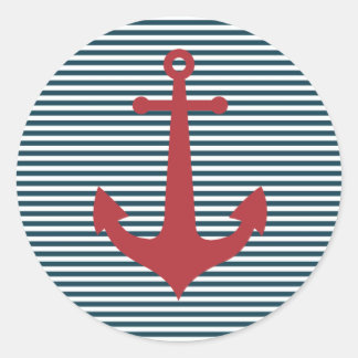 Red nautical anchor on striped blue background runder aufkleber