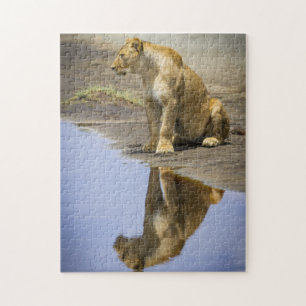 Reflexion eines Löwin-Puzzlespiels Puzzle