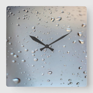 Regen am Fenster Quadratische Wanduhr