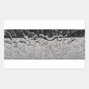 Regen fällt auf das Fenster Rechteckiger Aufkleber