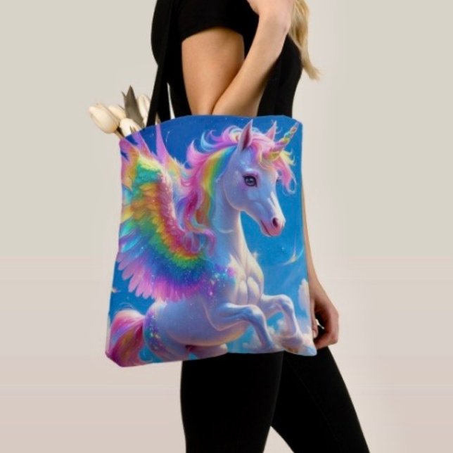 Regenbogenflügelndes tänzelndes Einhorn (Tote Bag — 100% polyester, black laminated lining 100% cotton web hand. Made in the USA.
)