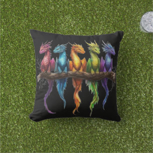 Regenbogengruppe von Baby-Drachen auf Schwarz Kissen