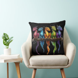 Regenbogengruppe von Baby-Drachen auf Schwarz Kissen