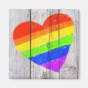 Regenbogenherz auf einer grungy hölzernen Platte Magnet