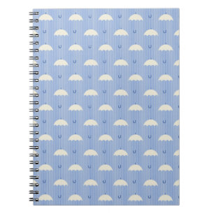 Regenschirme im Blau Notizblock