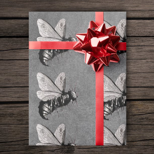 Reihen von gruseligen gotischen Bienen Schädel auf Geschenkpapier