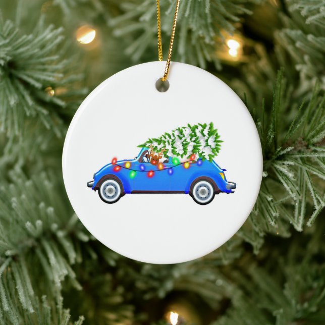 Reindeer driving a beetle with christmas treeb keramik ornament (Baum)