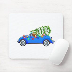 Reindeer driving a beetle with christmas treeb mousepad