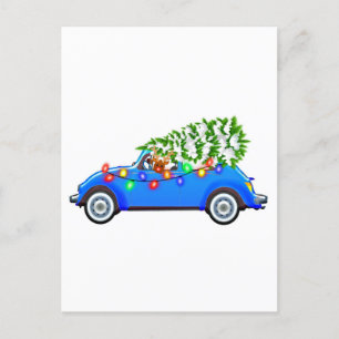 Reindeer driving a beetle with christmas treeb postkarte