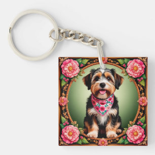 Reizender Hund, umrahmt von farbenfrohen Blumen Schlüsselanhänger