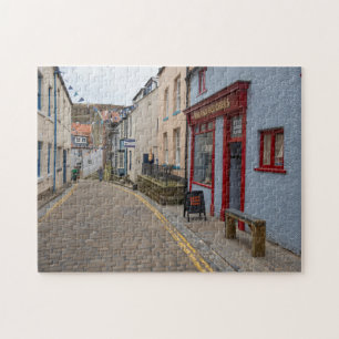 Reizvolle Kopfsteinpflasterstraße im Dorf Staithes Puzzle