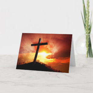 Religiöses Osterkreuz bei Sonnenuntergang Feiertagskarte